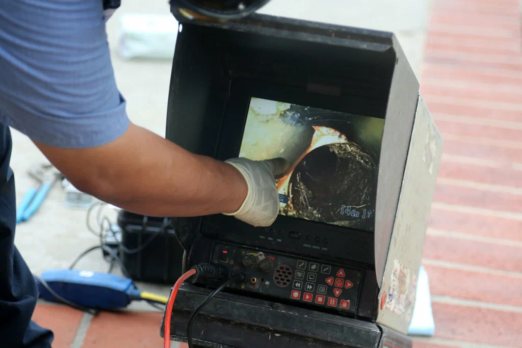 Technician viewing a drain inspection camera in Lebanon